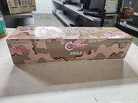 Box showing the side with branding and 1:24 scale die cast Top Fuel dragster details from 2003.