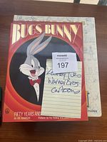 Front cover of Bugs Bunny hardcover book titled 'Fifty Years and Only One Grey Hare' by Joe Adamson with Bugs Bunny in tuxedo on cover.
