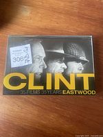 Front of the DVD box set showing Clint Eastwood faces and title.