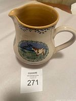 Full side view of the Nicholas Mosse hand-painted pitcher showing the cow and field design