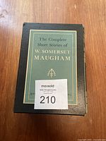 Slipcase containing the two volume set of The Complete Short Stories of W. Somerset Maugham with front label visible.
