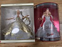 Barbie Special 2000 and 2001 Edition dolls in original retail packaging, showing front view with gowns, tiaras, and ornaments.