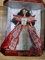 Barbie Special Edition Doll in red and gold dress new in box with holiday themed packaging