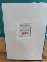 Front of collector box showing the label: Angels of Music Collection Harpist Angel Barbie