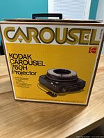 Front view of the original Kodak Carousel 760H projector box showing product image and branding.