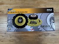 Box showing PYLE Gear X PLG6.3 6.5 inch 280 watt three-way speakers pair, front side with large speaker photo and packaging graphics.