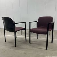 Front three-quarter view of both chairs showing upholstery, frames, and overall form