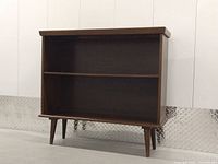 Front view of bookcase showing overall design and two shelves