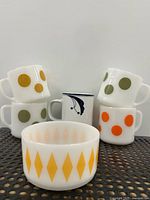 Group shot of all mugs and bowl