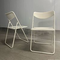 Two Ted chairs side by side, showing overall design and color difference