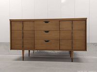 Full frontal view of nine-drawer walnut dresser