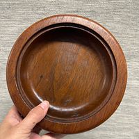 Top view of wooden ashtray tray showing interior and rim