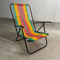 Full view of chair in upright position showing frame and fabric