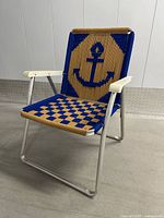 Front view showing anchor motif, chair structure and colors