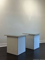 Pair of white cube end tables with mirror tops