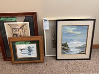 Four framed artworks including a duck print, rustic building print, natural scenery print, and an oil painting of a lake and mountains.