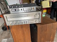 Front view of deck, receiver and two speakers lined up