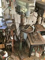 Full view of floor drill press in garage setting