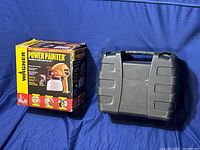 Wagner Power Painter boxed item and black carrying case on blue background