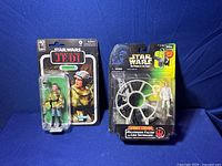 Front view of two Star Wars action figures in original packaging: Return of the Jedi and The Power of the Force series