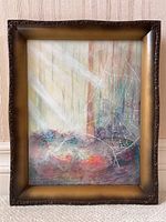 Framed abstract painting showing the full artwork with spider web detail and signature visible at bottom.