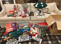 Overview of entire lot displayed on sofa and floor