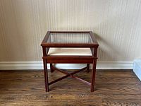 Front view of assembled side table display case, closed lid.