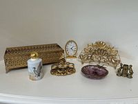 Group shot of all vanity accessories arranged on flat surface