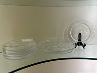 Five Yeoward plates stacked, Verlys platter and one Yeoward plate on display