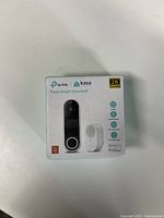 Box front showing TP-Link Kasa Smart Doorbell with 2K resolution and product image