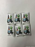 Six boxed bottles of Black Currant Seed Oil arranged in two rows of three on a white background.