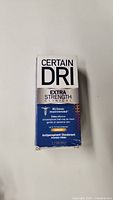 Front view of Certain Dri antiperspirant box showing product branding and claims including 72 hour protection and extra strength.