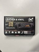 Box front showing professional black leather & vinyl repair kit, branding, and use examples.