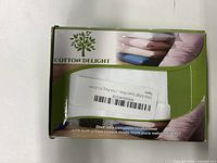 Box of Cotton Delight Queen Pillow showing product branding and pillow size with natural fiber pillow covers.