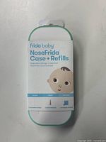 Front view of Frida Baby NoseFrida Case + Refills packaging showing clean storage case and refill info.