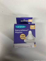 Front view of Lansinoh NaturalWave silicone nipple box showing product name, count, and fast flow information.