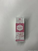 Front view of the sealed Leven Rose Natural Beauty serum box showing branding and product name