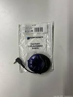 Front view of Poly Busy Light in original Plantronics factory replacement parts bag, showing product and label details.