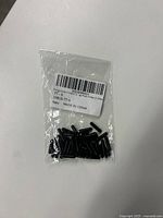 Bag of black plastic prong collar covers small size 22mm unopened in plastic packaging with label