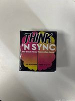 Front view of the boxed Think 'N Sync game in shrink wrap showing title, player count, and age recommendation.