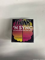 Front of sealed Think 'N Sync card game box, showing title, player count, and age range.