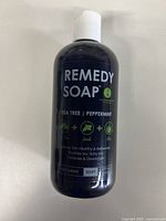 Front of the bottle showing branding and product type