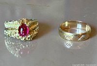 Overview of both rings side by side on flat surface