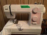 Front view of the Janome Limited Edition sewing machine showing stitch options, dials, and the note indicating 'No case'.