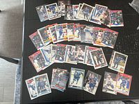 Overhead view showing entire spread of Joe Sakic cards