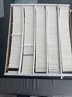 Top view of five-row storage box packed with hockey cards