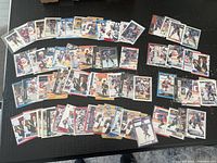 Overhead view of entire spread of approximately 90 Mark Messier cards