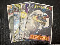 Stack of four bagged Deathlok comics partially fanned