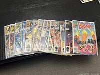 All 14 bagged New Mutants comic books fanned out