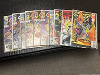 All ten Ghost Rider comics fanned out showing front covers in sleeves
